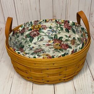 Longaberger Circular Basket with Floral Lining and plastic insert like new